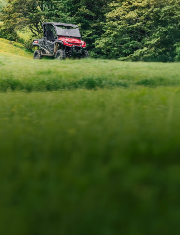 Pioneer 1000 Deluxe working on a farm